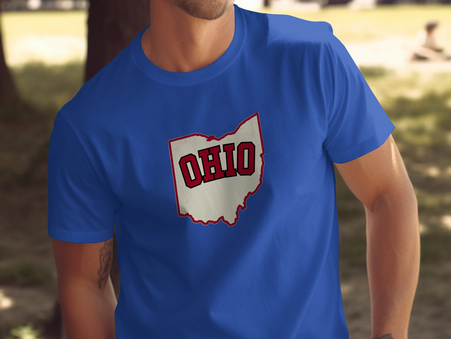 Blue t-shirt with "OHIO" text inside a state outline.