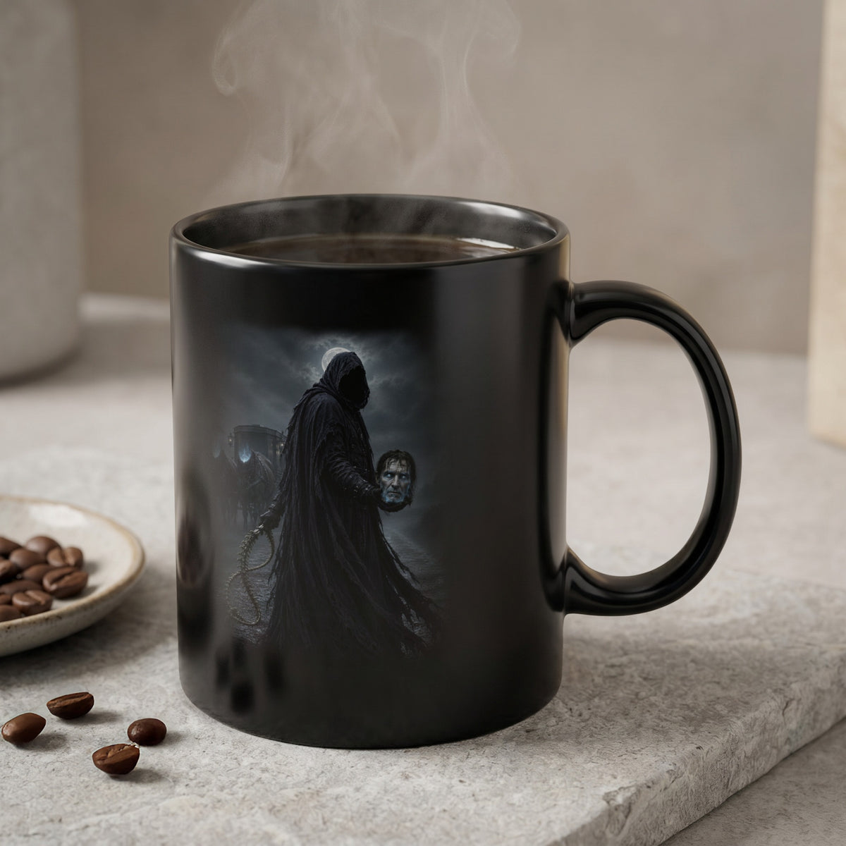Black mug with a dark fantasy depiction of a hooded figure holding a severed head.