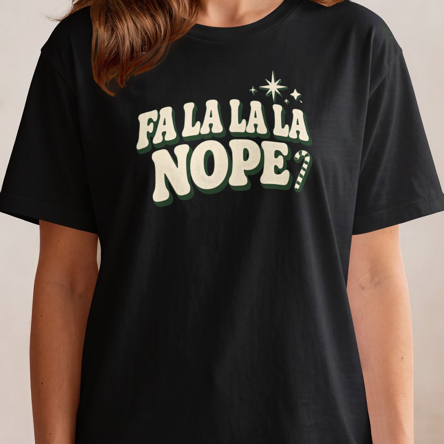 Black t-shirt with "Fa La La La NOPE" graphic and a candy cane.