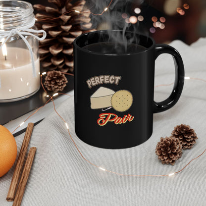 Cheese and Crackers image with Perfect Pair text phrase on an 11/15oz Black Mug