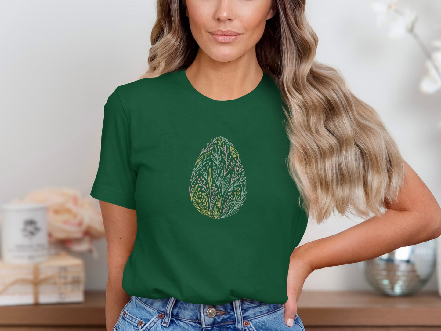 Green T-Shirt with Intricate Leaf Egg Illustration Design