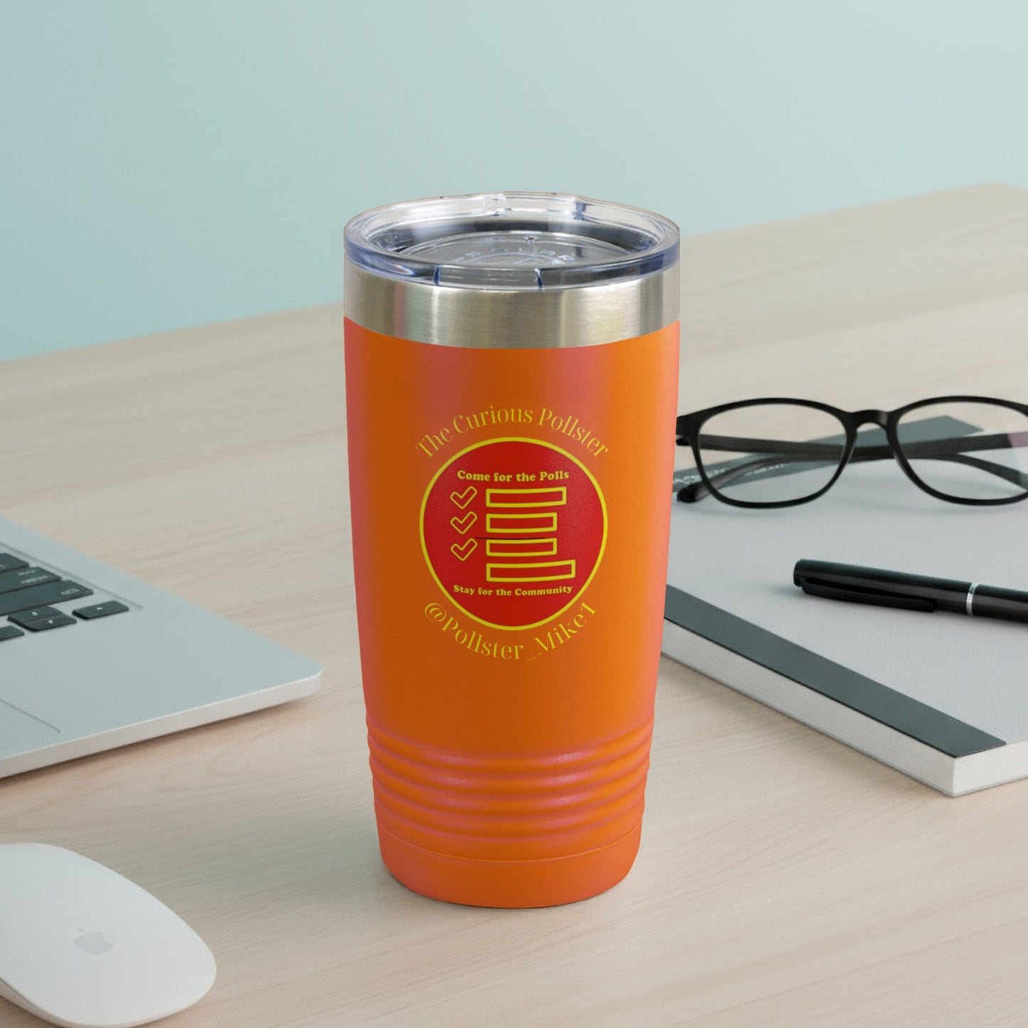 Orange tumbler with "The Curious Pollster" text and "@Pollster Mike1" username.