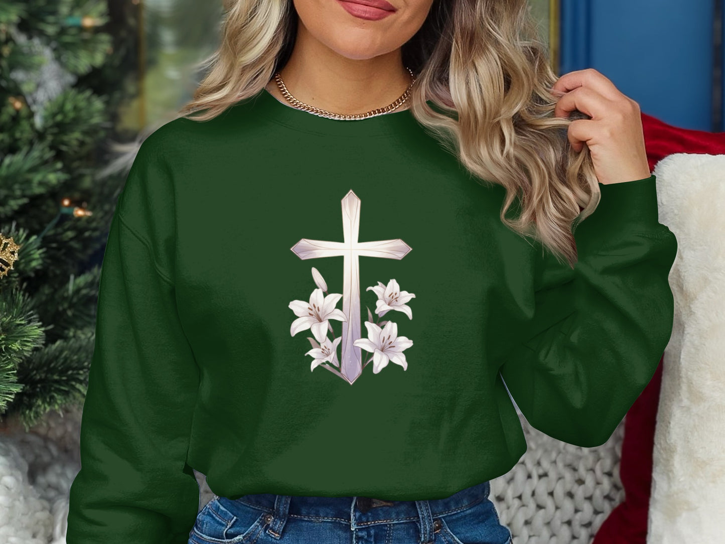 Green sweatshirt featuring a white cross adorned with lilies.