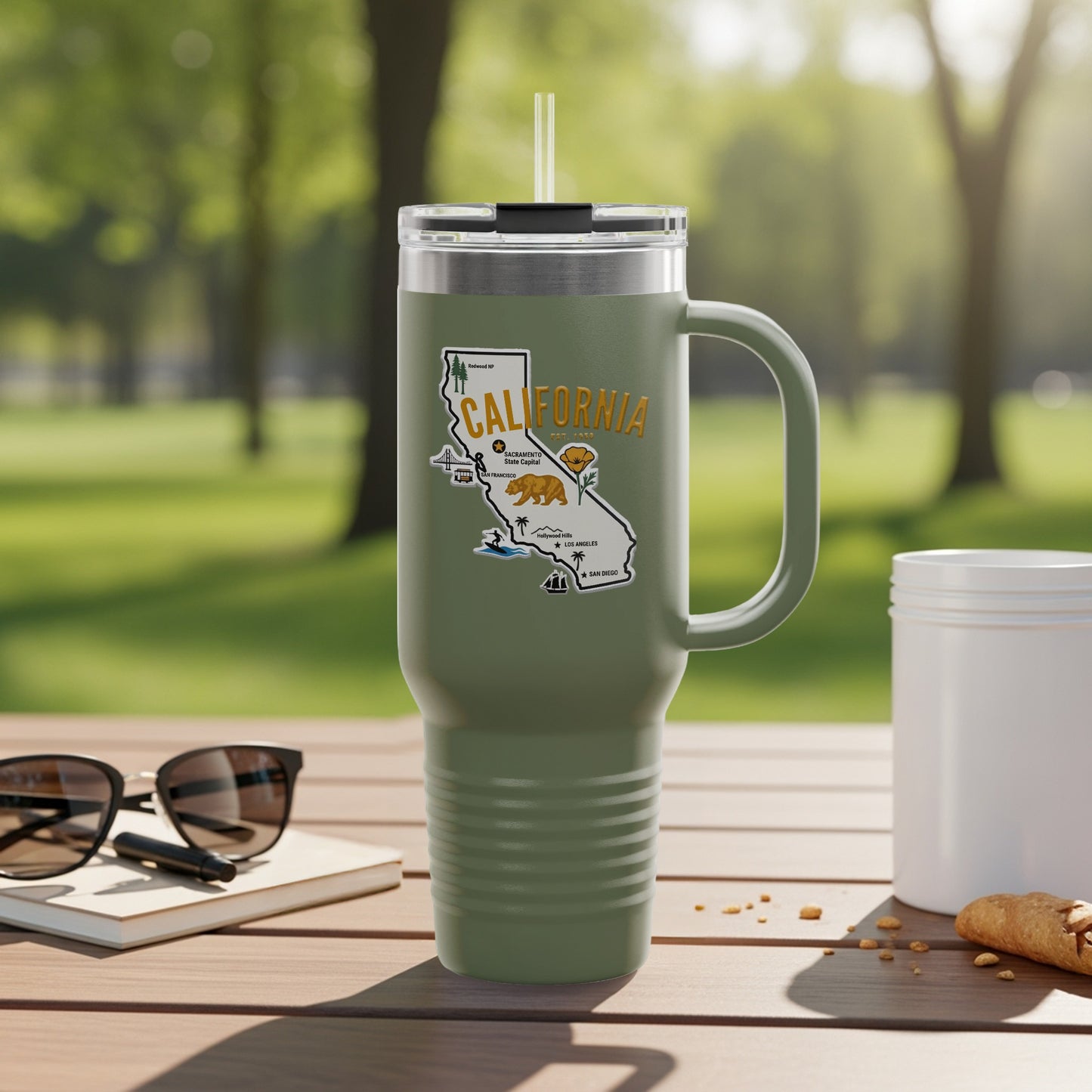 Green travel mug with California map and cities design.