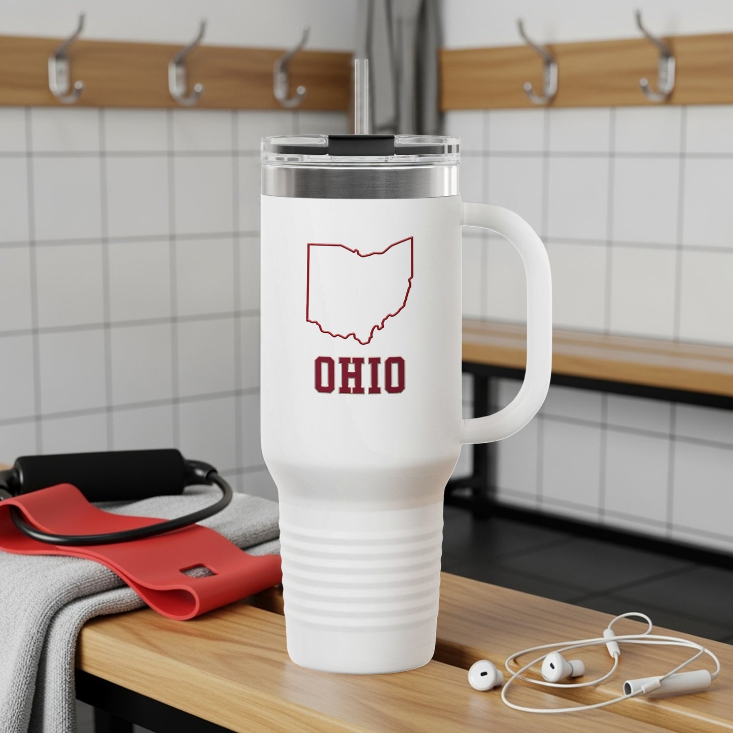 Travel mug with Ohio map graphic and city names.