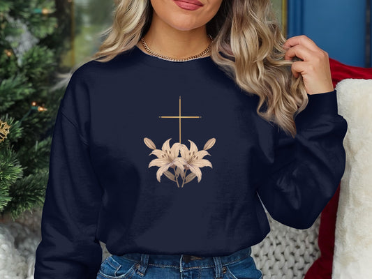 Navy crewneck sweatshirt with a golden cross and lily design.
