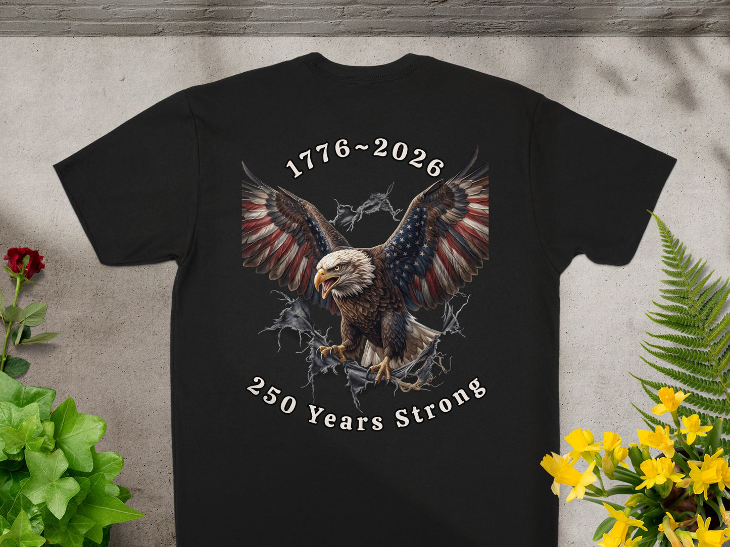 Black t-shirt with eagle, American flag wings, and "1776~2026 250 Years Strong" text.