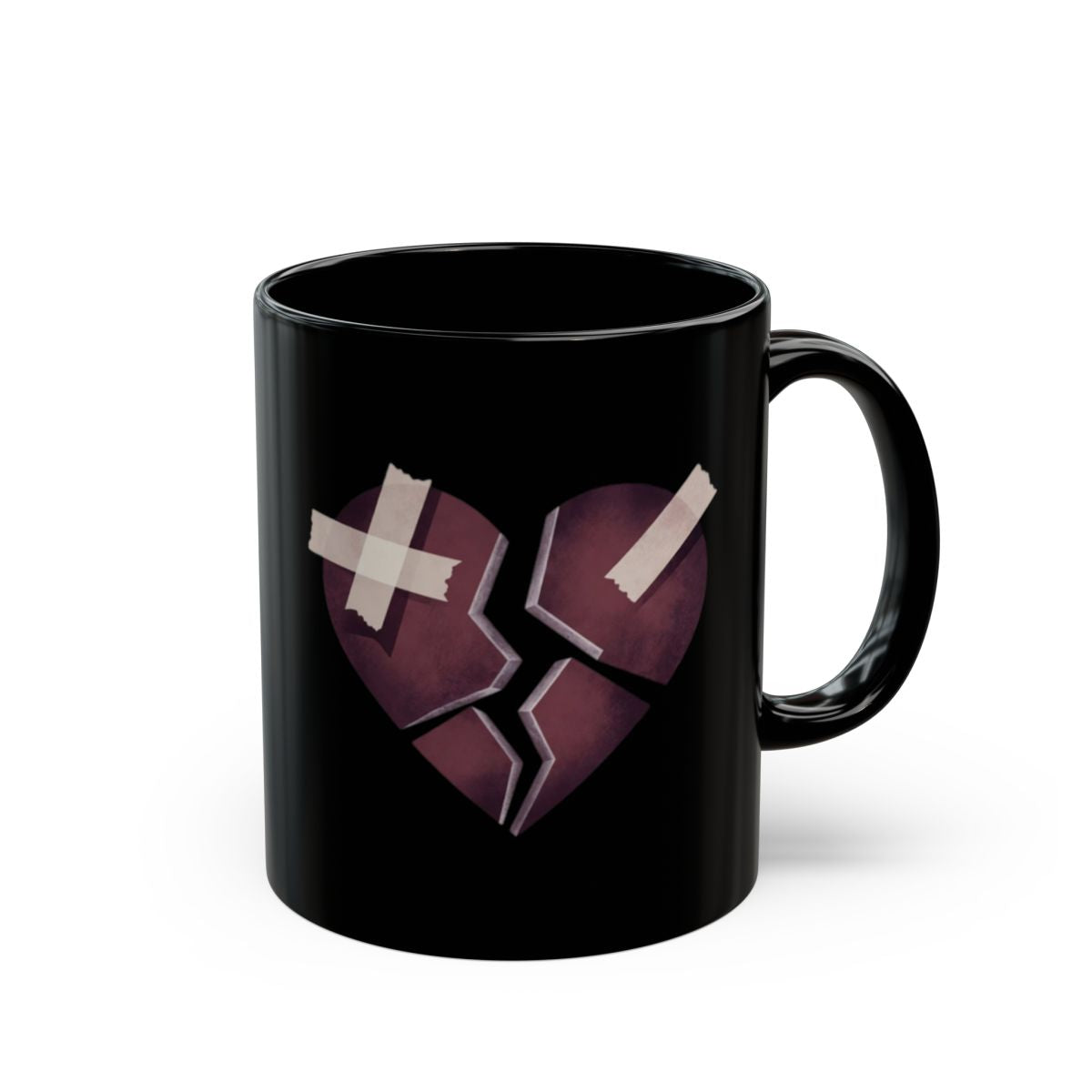 Black Mug with Broken Heart and Tape Design