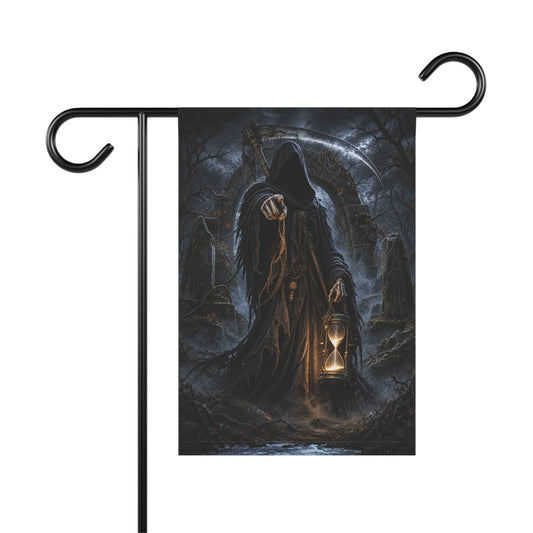 A garden flag on a black stand featuring a hooded grim reaper holding an illuminated hourglass.