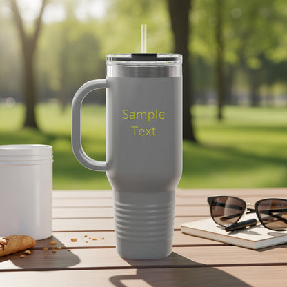 Gray tumbler with handle and straw, "Sample Text" in yellow.