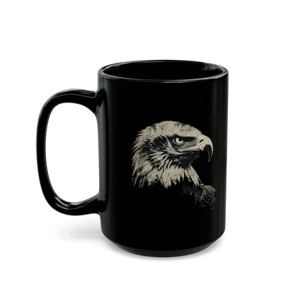 Black mug with a detailed grayscale eagle head profile illustration.