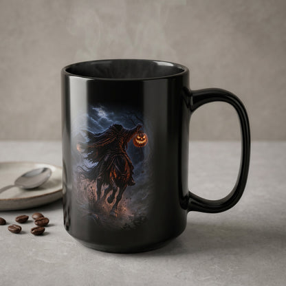 Black mug with Headless Horseman holding jack-o'-lantern design.