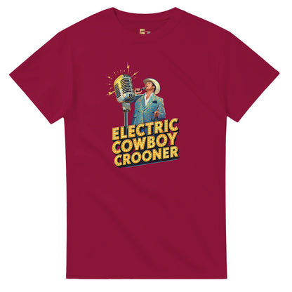 Person wearing a blue t-shirt with 'Electric Cowboy Crooner' design in a mall setting