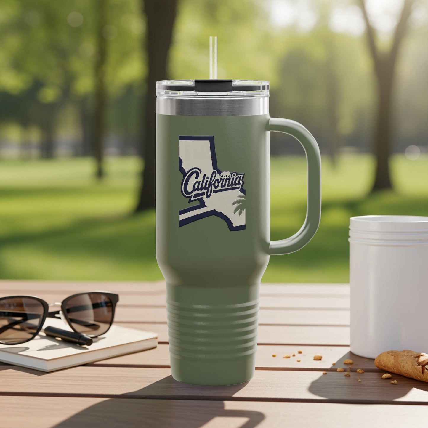 Olive green tumbler with California outline and text.