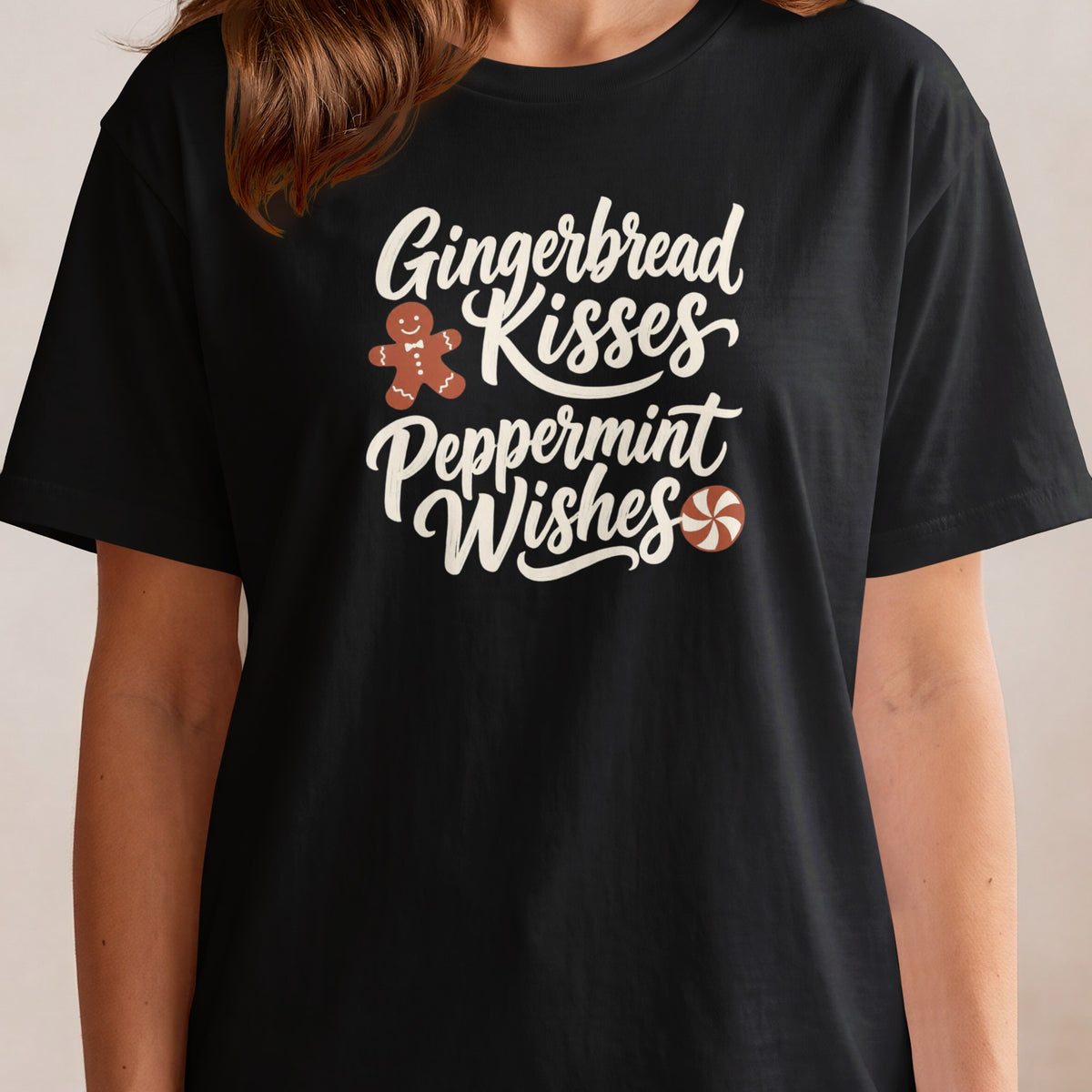 Black t-shirt with "Gingerbread Kisses Peppermint Wishes" text and graphics.